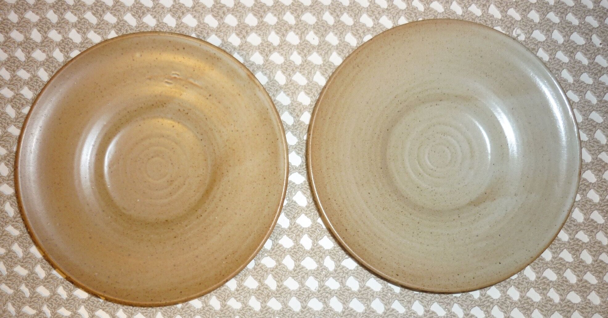Pair of CNP Village France stoneware saucers
