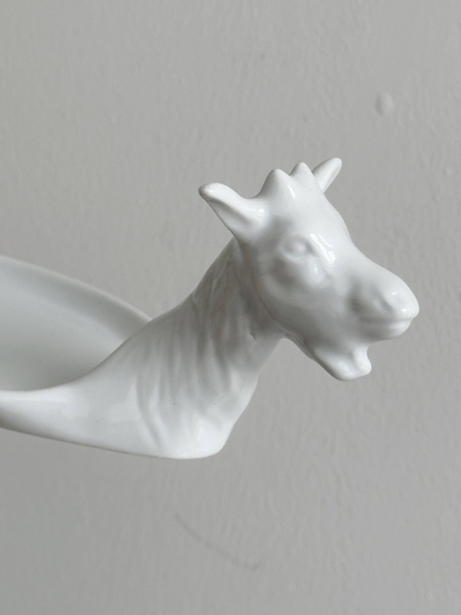 Avignon white porcelain dish in the shape of a goat.