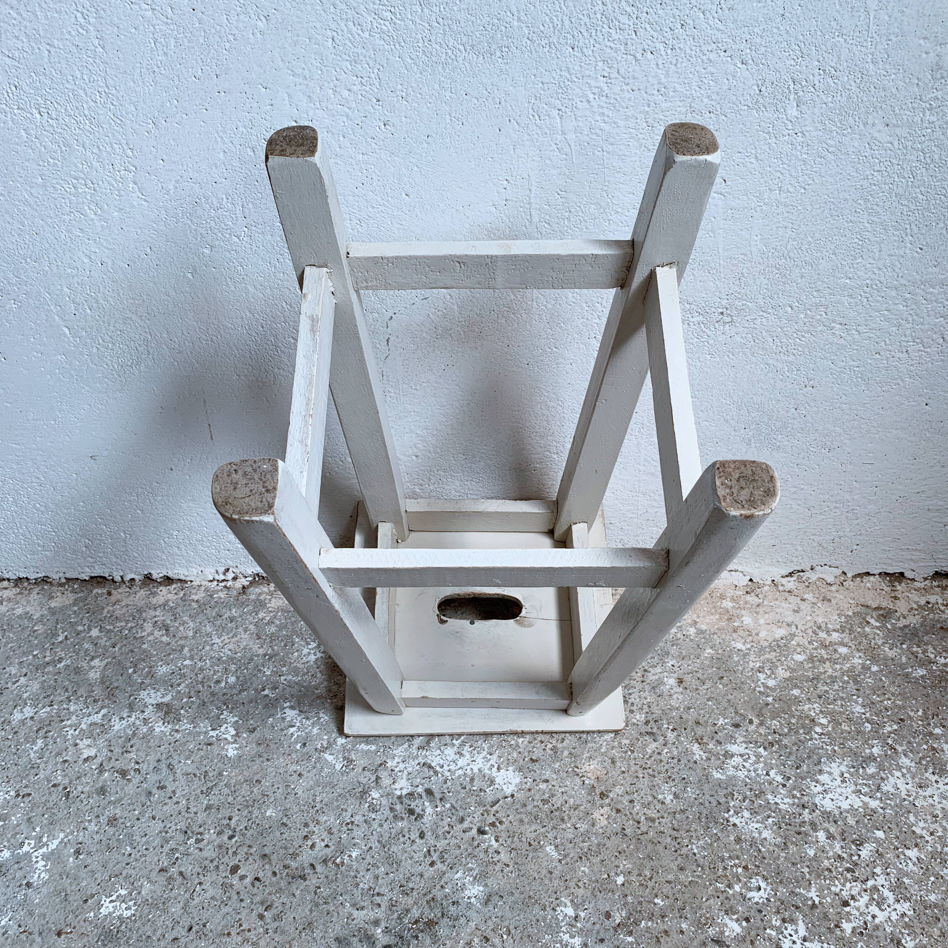 White wooden workshop stool