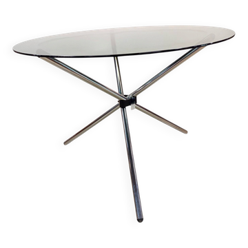 Vintage round table with smoked glass and foldable chrome legs.