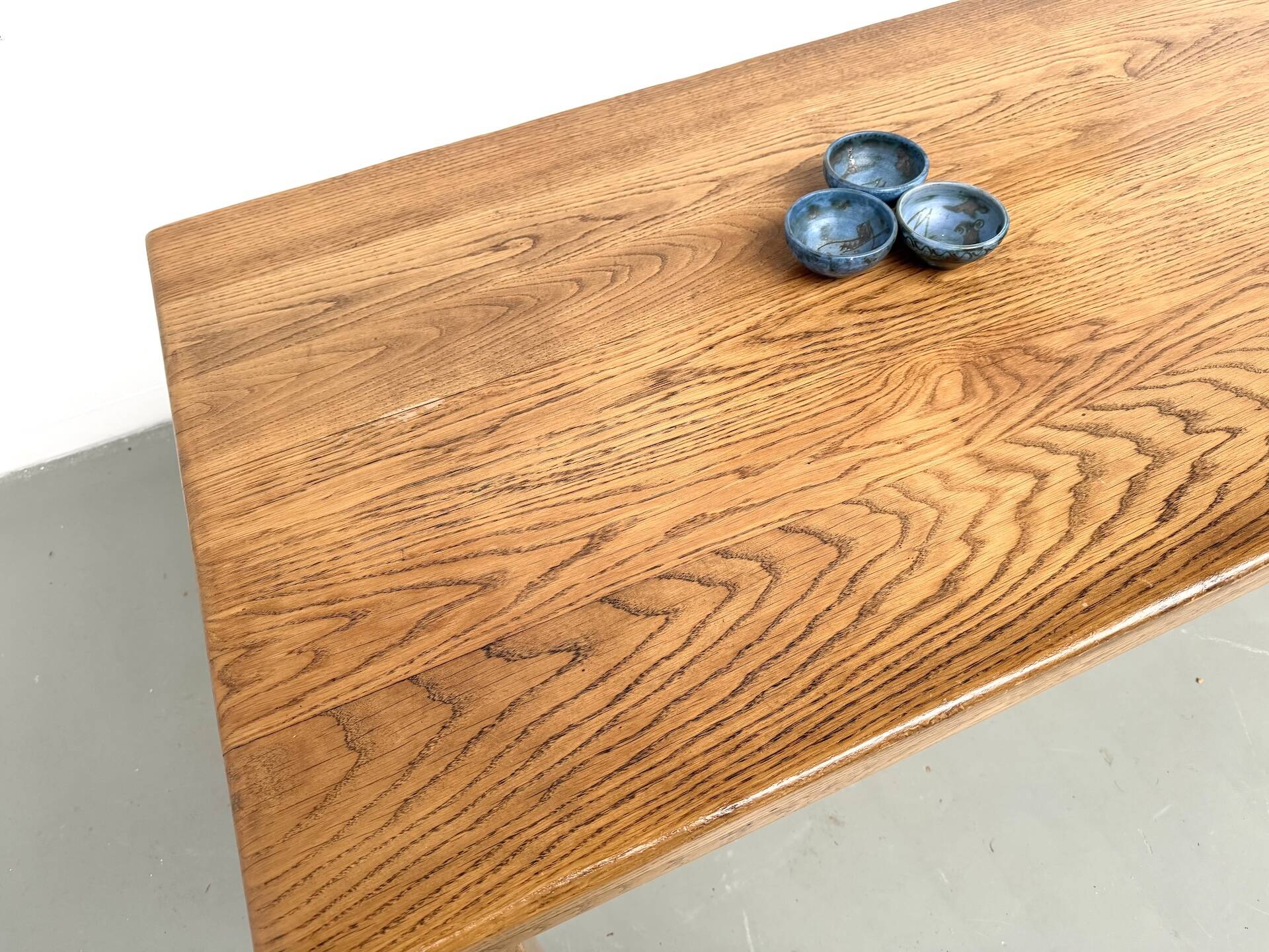 Solid oak farmhouse table, square legs.