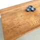 Solid oak farmhouse table, square legs.