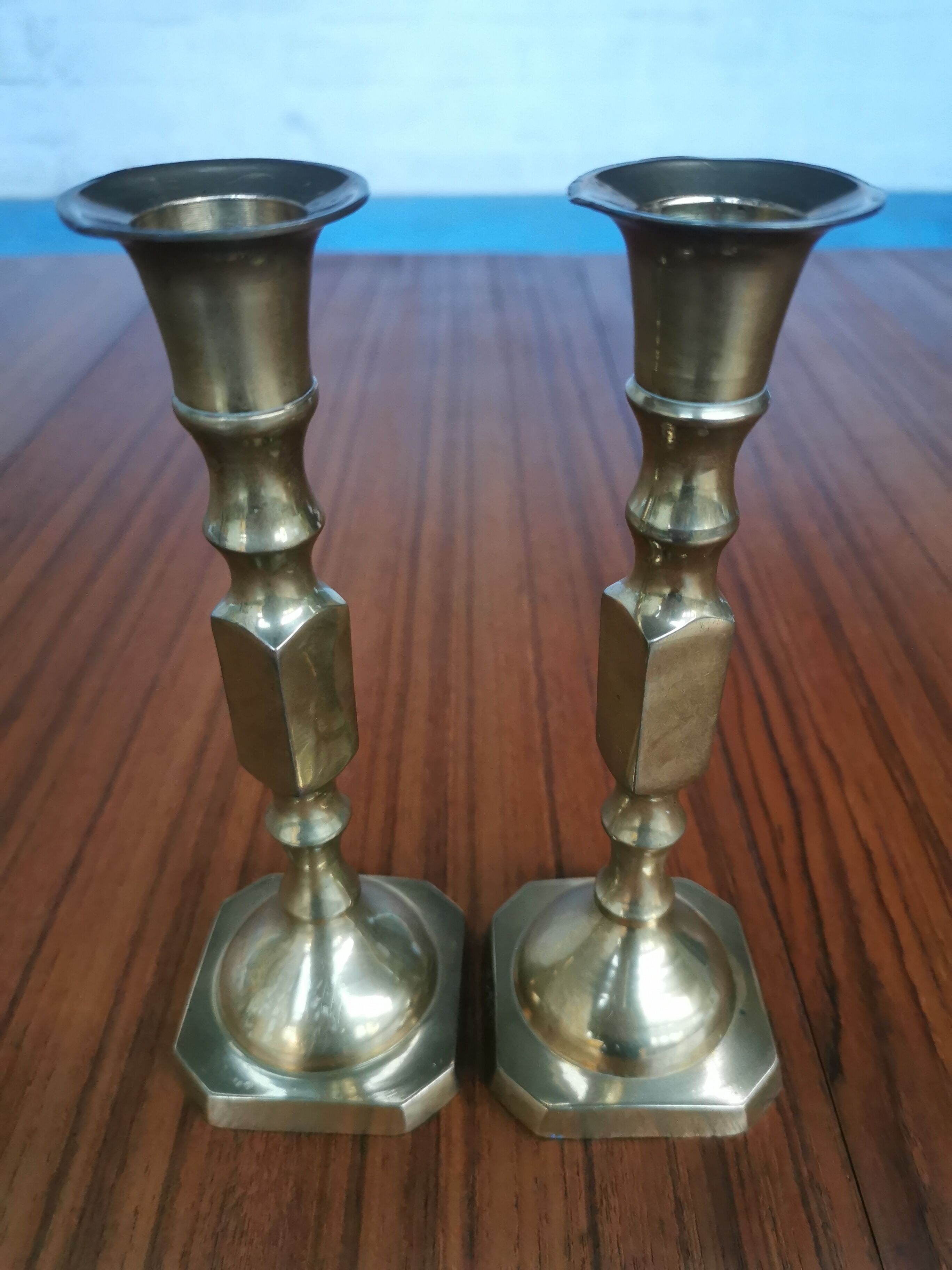 Duo of brass candle holders