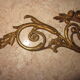 Fronton ancien en bronze