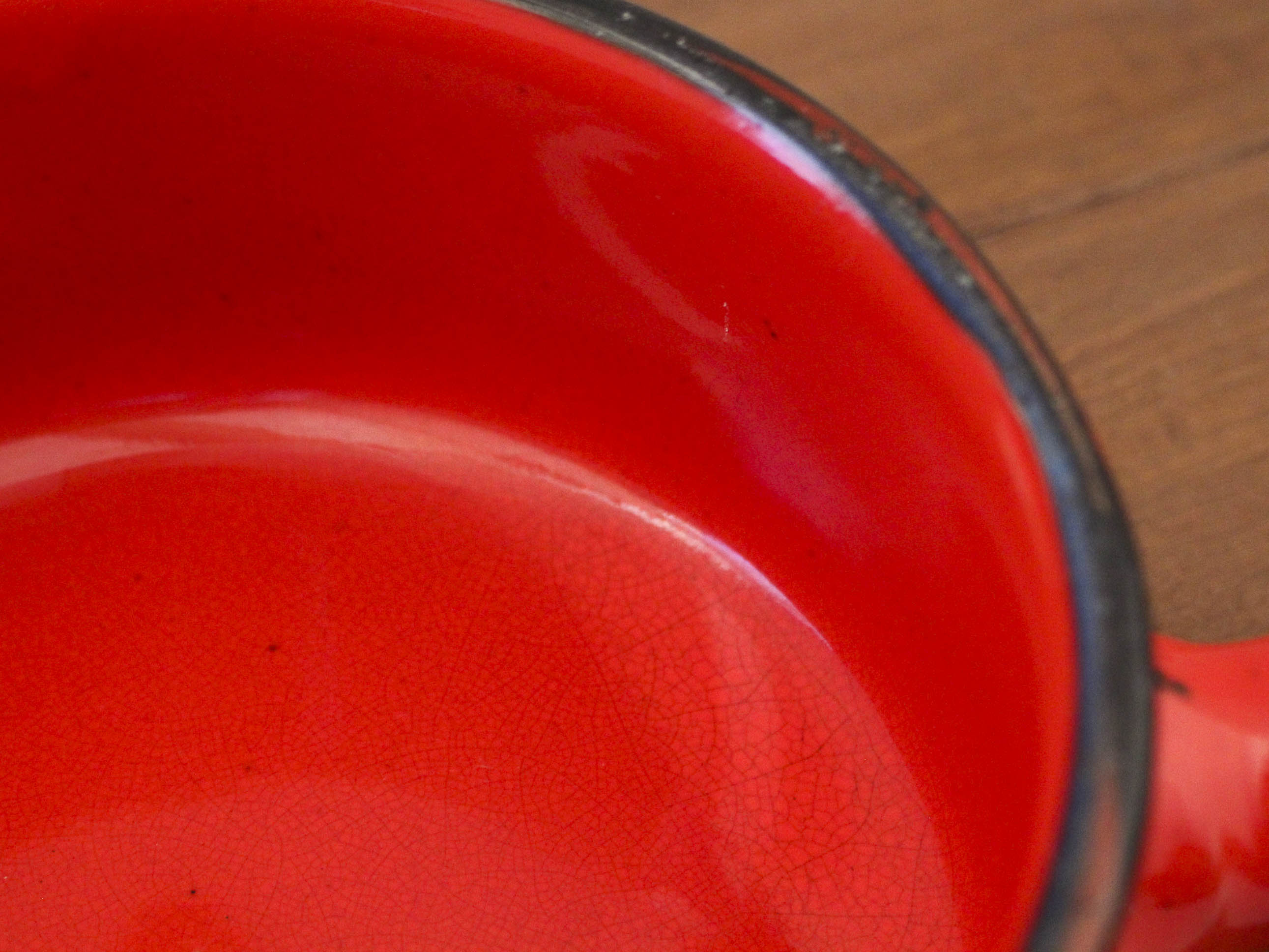 Vintage poelon in bright red glazed ceramic