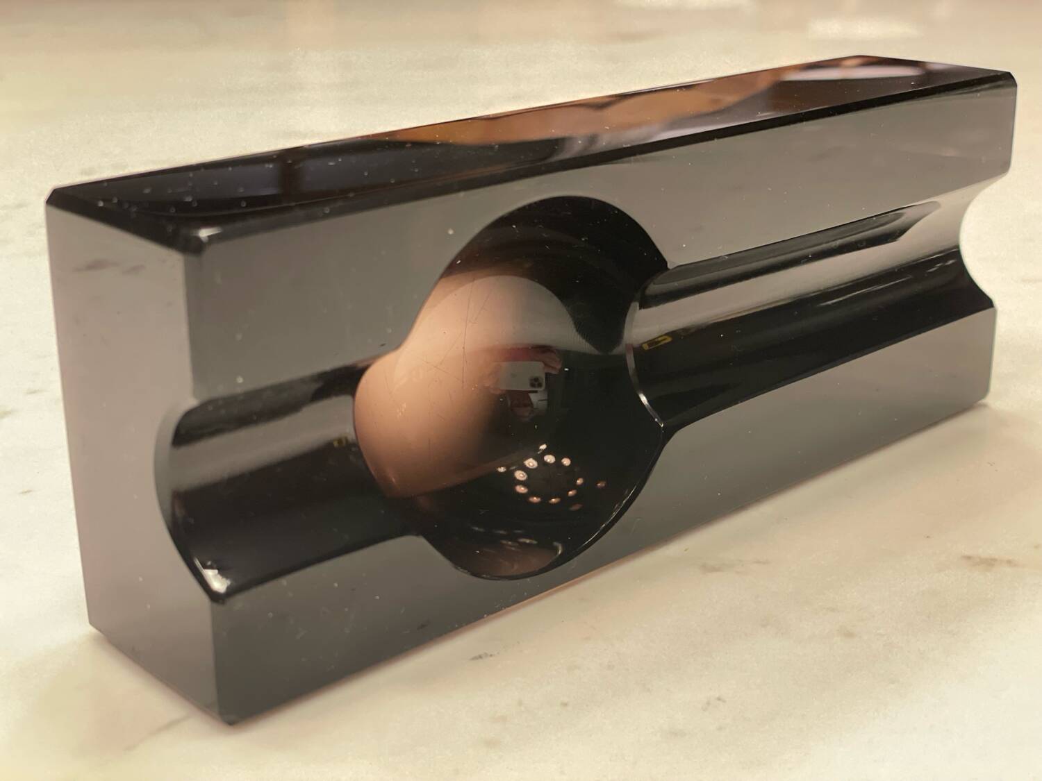 Individual cigar ashtray in black glass
