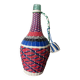 Old glass bottle and vintage scoubidou plastic weaving