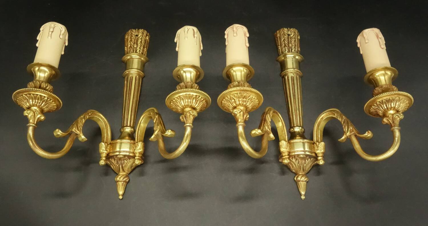 Pair of Louis XVI style quiver sconces in gilded bronze