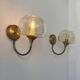 Pair of vintage wall lights in brass and smoked glass, France, 1970.