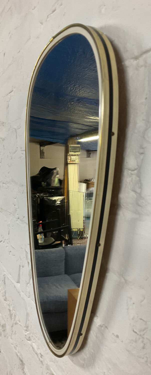 Asymmetrical free-form mirror from the 60s-70s