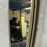 Asymmetrical free-form mirror from the 60s-70s