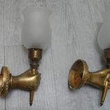Pair of golden bronze flambeau sconces