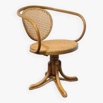 Vintage bent wood swivel chair.