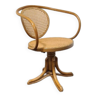 Vintage bent wood swivel chair.