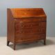 Antique drop-leaf cabinet in walnut with maple inlays, Italy, mid-18th century.