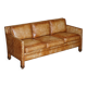 Three-seater leather canapé in Edwardian style with studs.