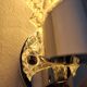 Pair of vintage Art Deco space age chrome and molded glass wall sconces