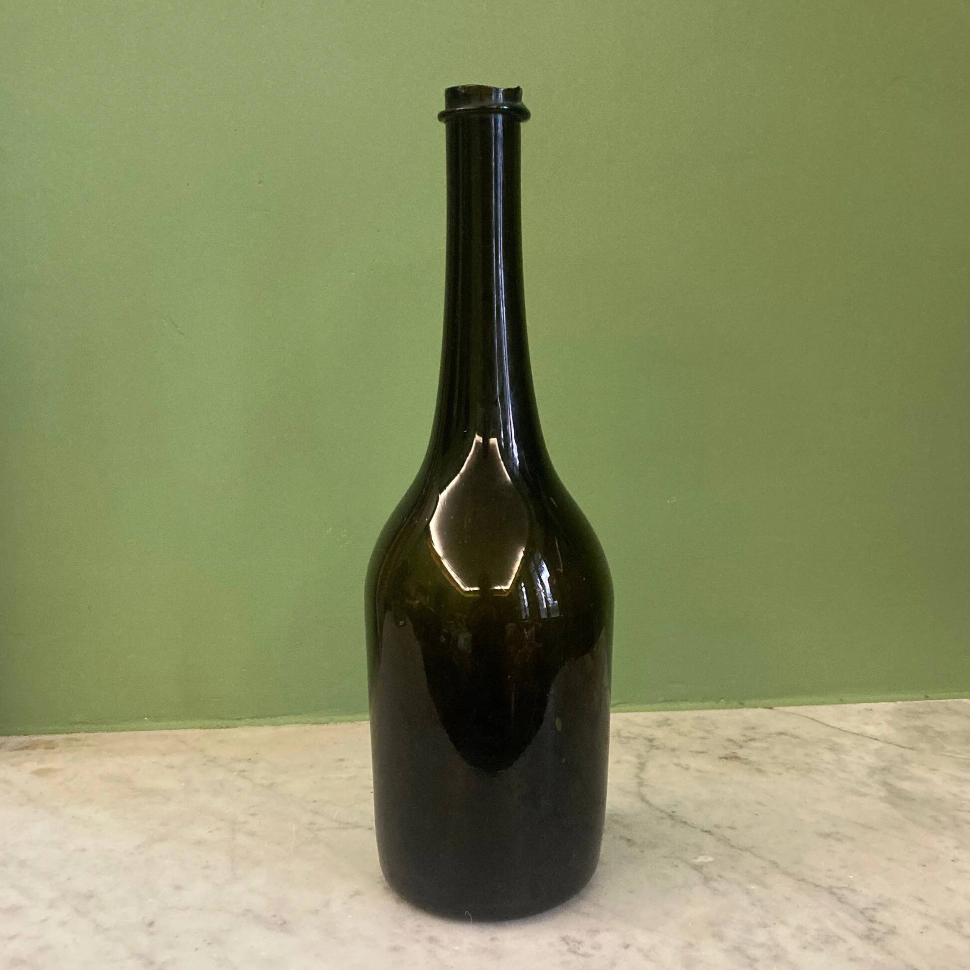 18th-century antique blown glass bottle