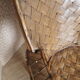 Old chair in braided chestnut