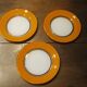 Small vintage orange and white Duralex plates
