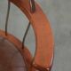 Swivel side chair / office chair with a cognac-coloured cow leather seat