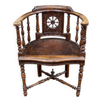 18th century Breton office chair in solid curved and carved wood