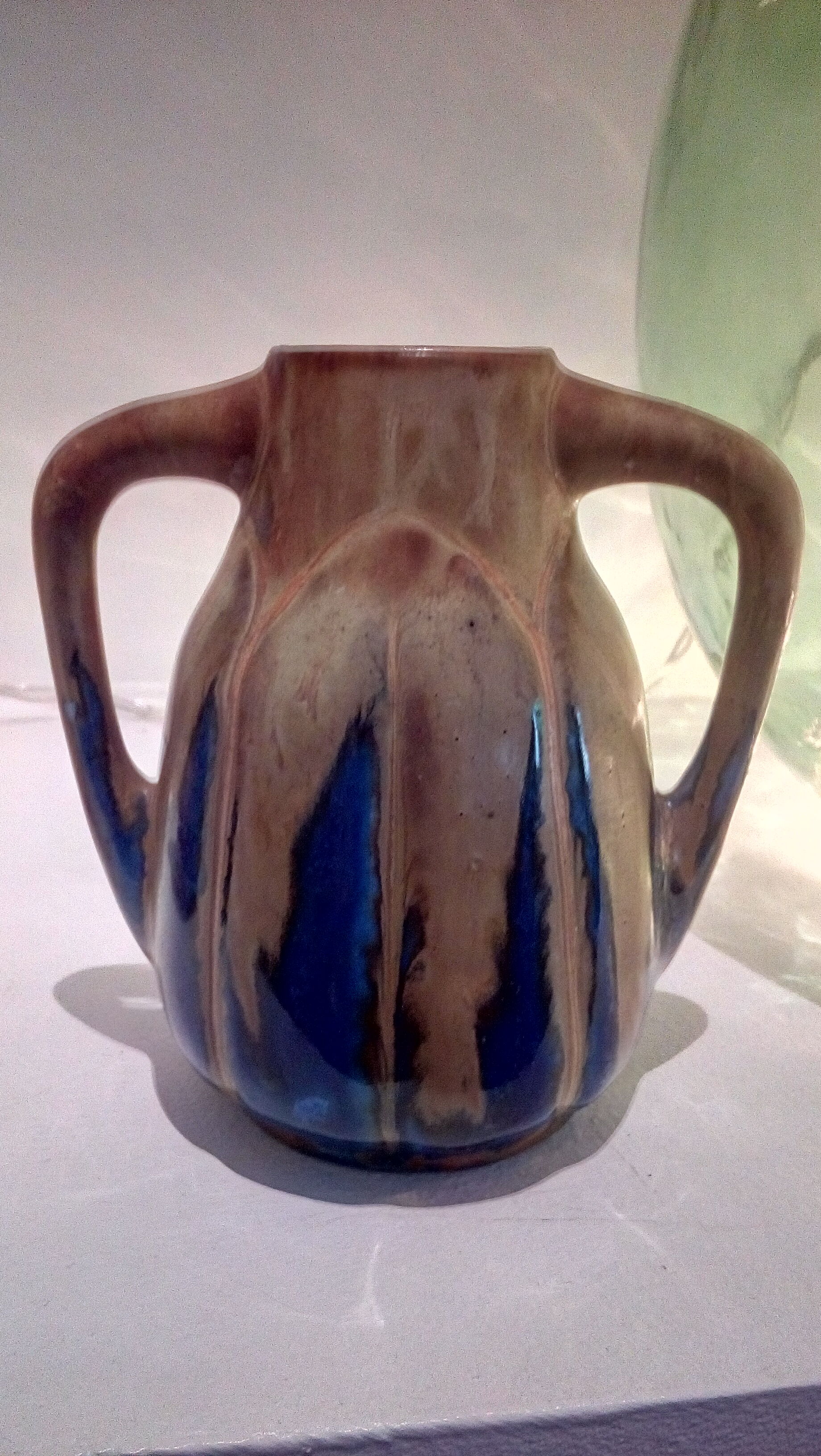 Blue enamelled flamed sandstone vase by Méténier
