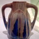 Blue enamelled flamed sandstone vase by Méténier