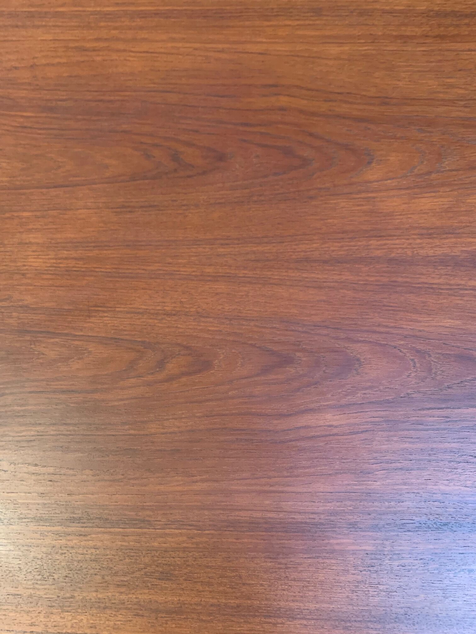 Dark teak dining table by Johannes Andersen for Uldum Møbelfabrik, Denmark