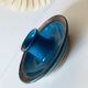 Blue enamelled sandstone candlestick