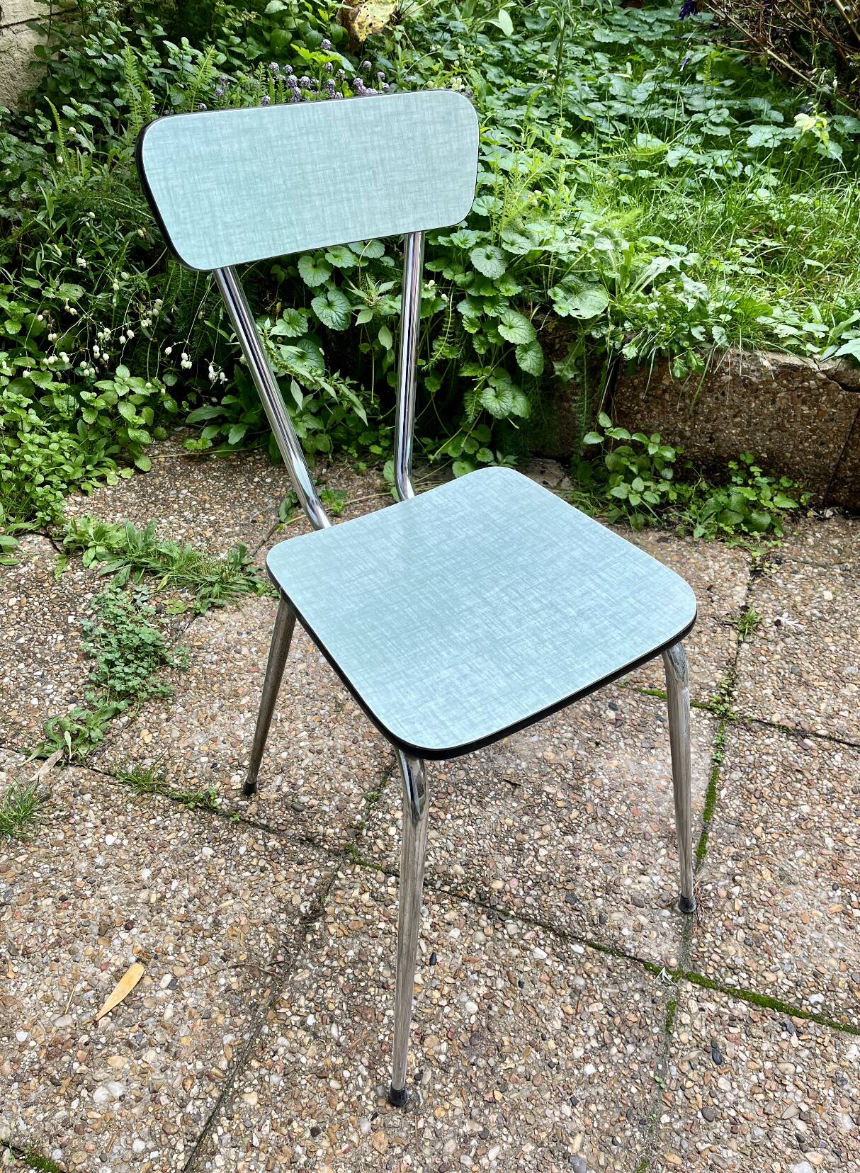 Green-blue Formica chair