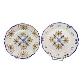 Pair of Nevers earthenware plates signed Georges