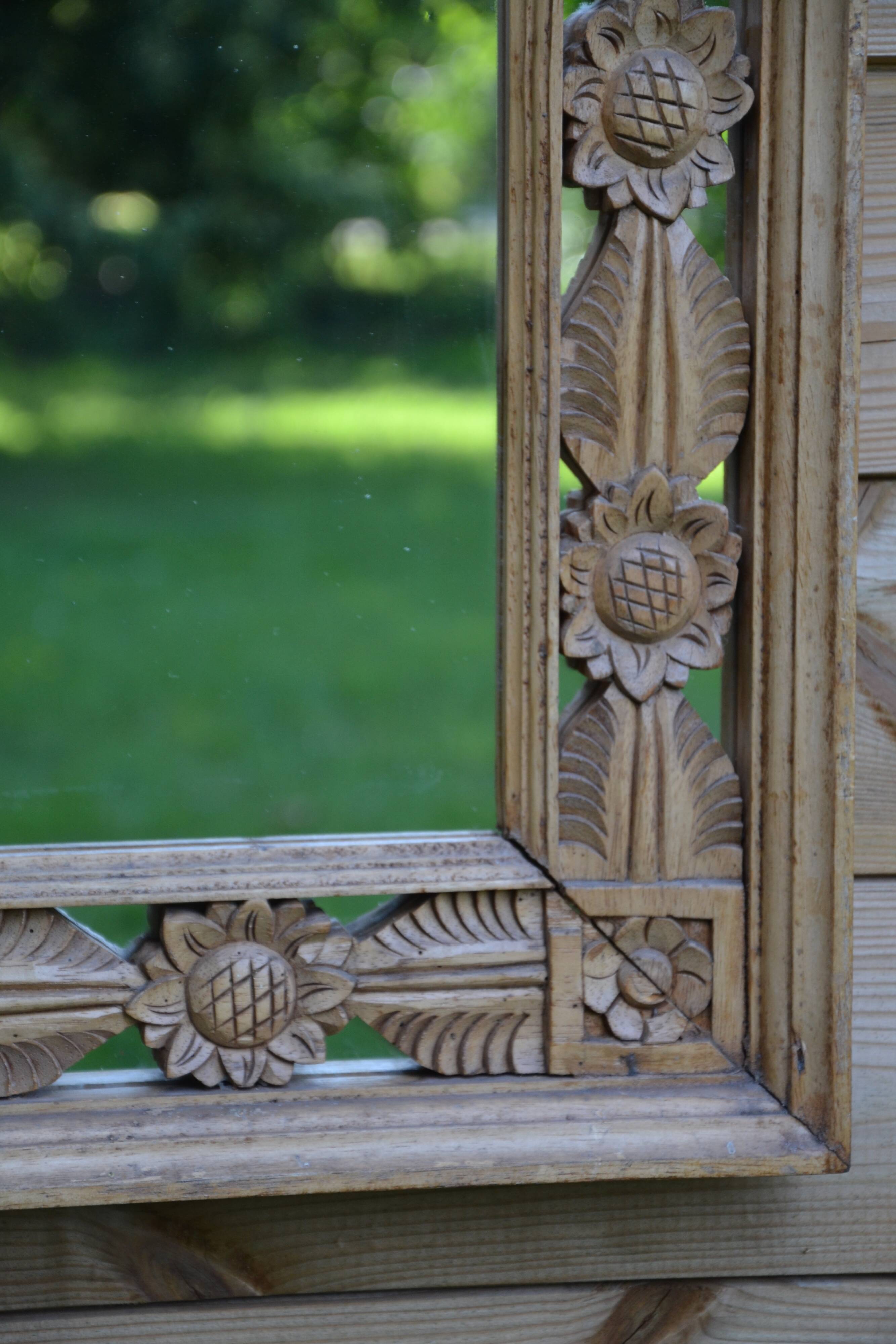 Large carved wooden mirror