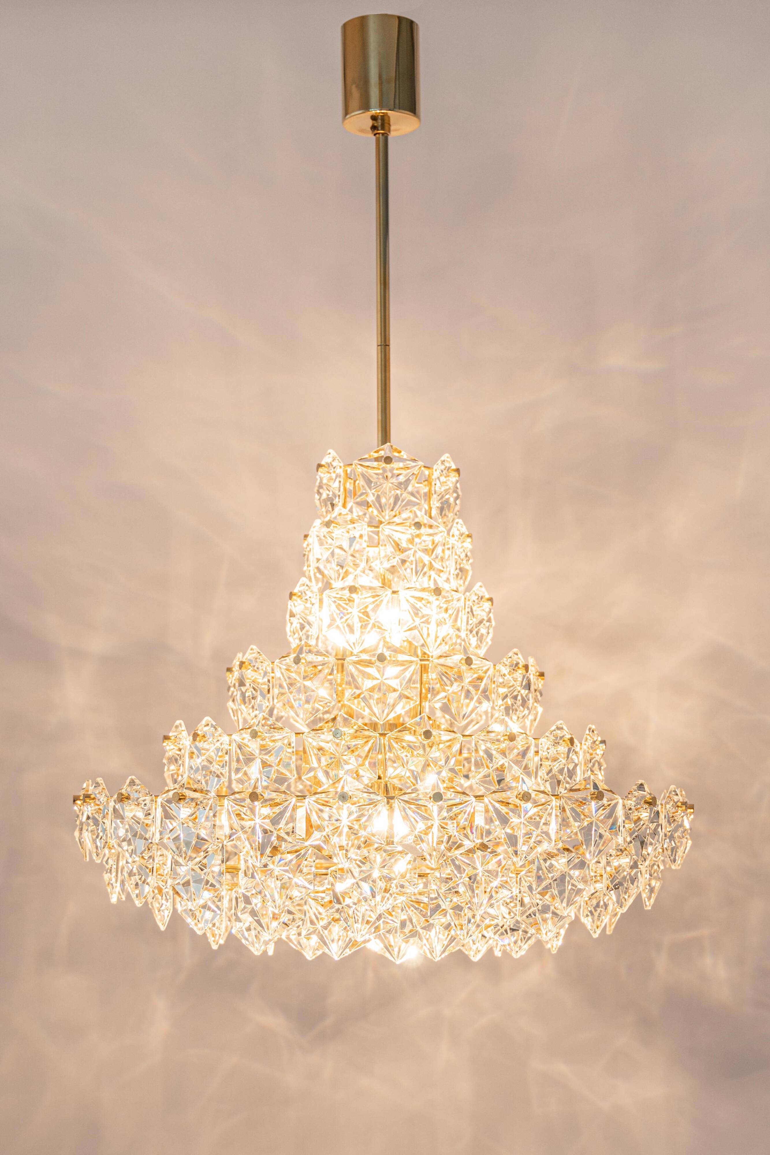 Chandelier, brass and crystal glass by Kinkeldey, Germany, 1970s.