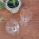 2 small stemmed glasses