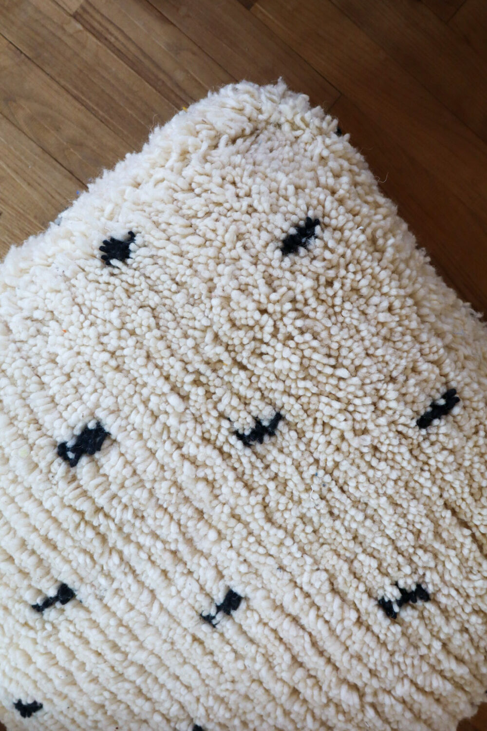 Moroccan Berber white pouf with bohemian polka dots