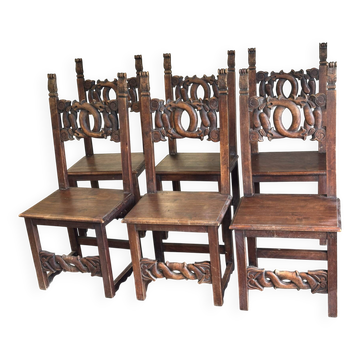 6 Alsatian chairs from the 19th century in carved wood with interlaced decoration.