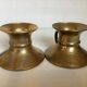 Pair of rat cave candlesticks with tulip base in bronze.