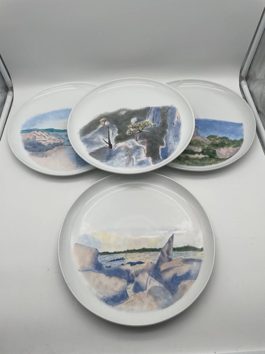 Hand painted porcelain plate with landscape decoration