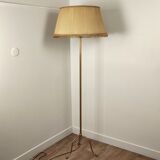 Golden tripod floor lamp