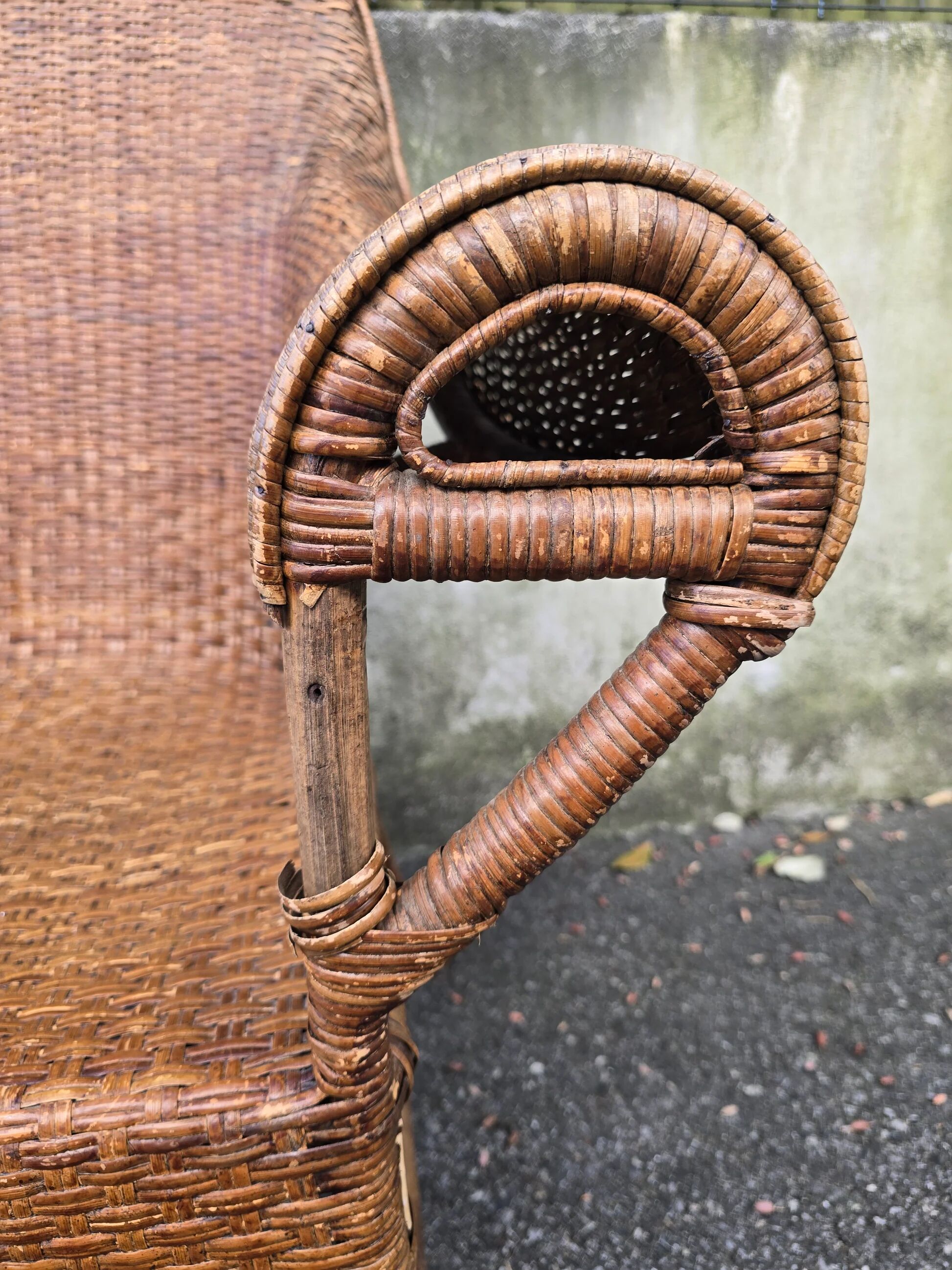 Arts & Crafts armchair in wicker and rattan attributed to Dryad & Co, UK, circa 1920.