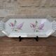 Limoges enamel porcelain cake dish LF with lilac flower decoration.