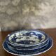 Asian porcelain plates decorated with blue dragons