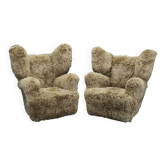 Paire rare de fauteuils à oreilles en peau de mouton Skandilock monumentaux Art Déco des années 1930
