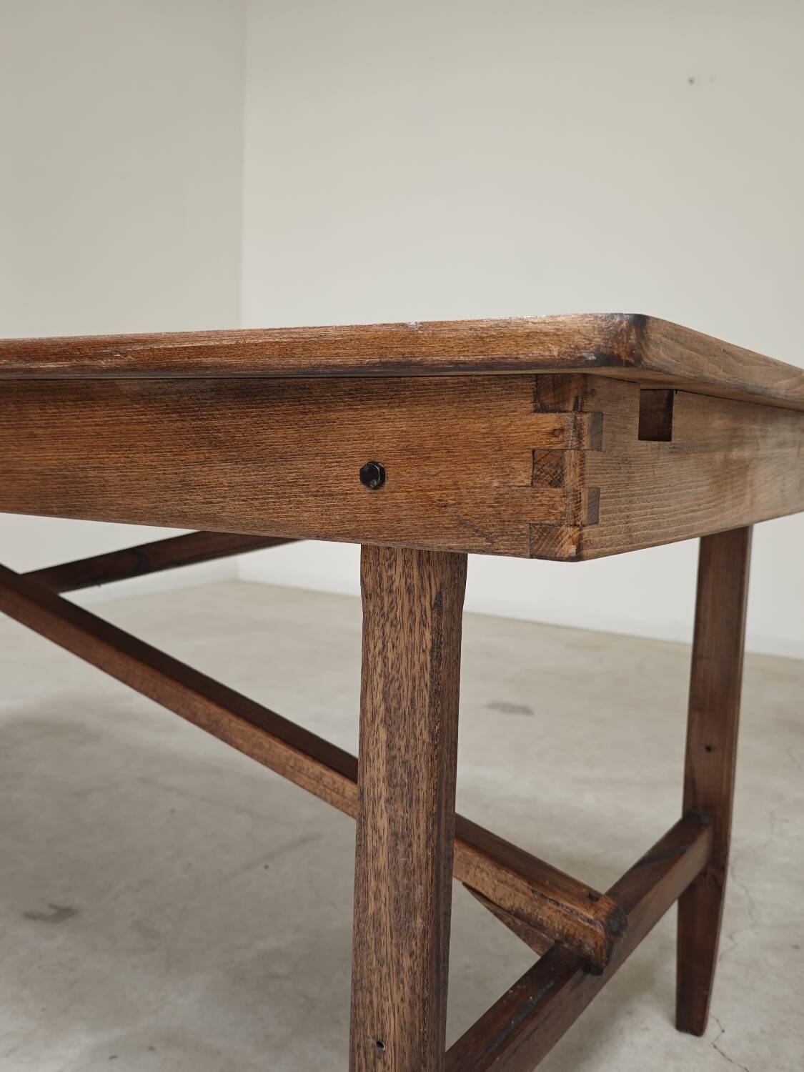 Vintage workshop folding table in oak with a hand-patinated black top.