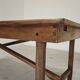 Vintage workshop folding table in oak with a hand-patinated black top.