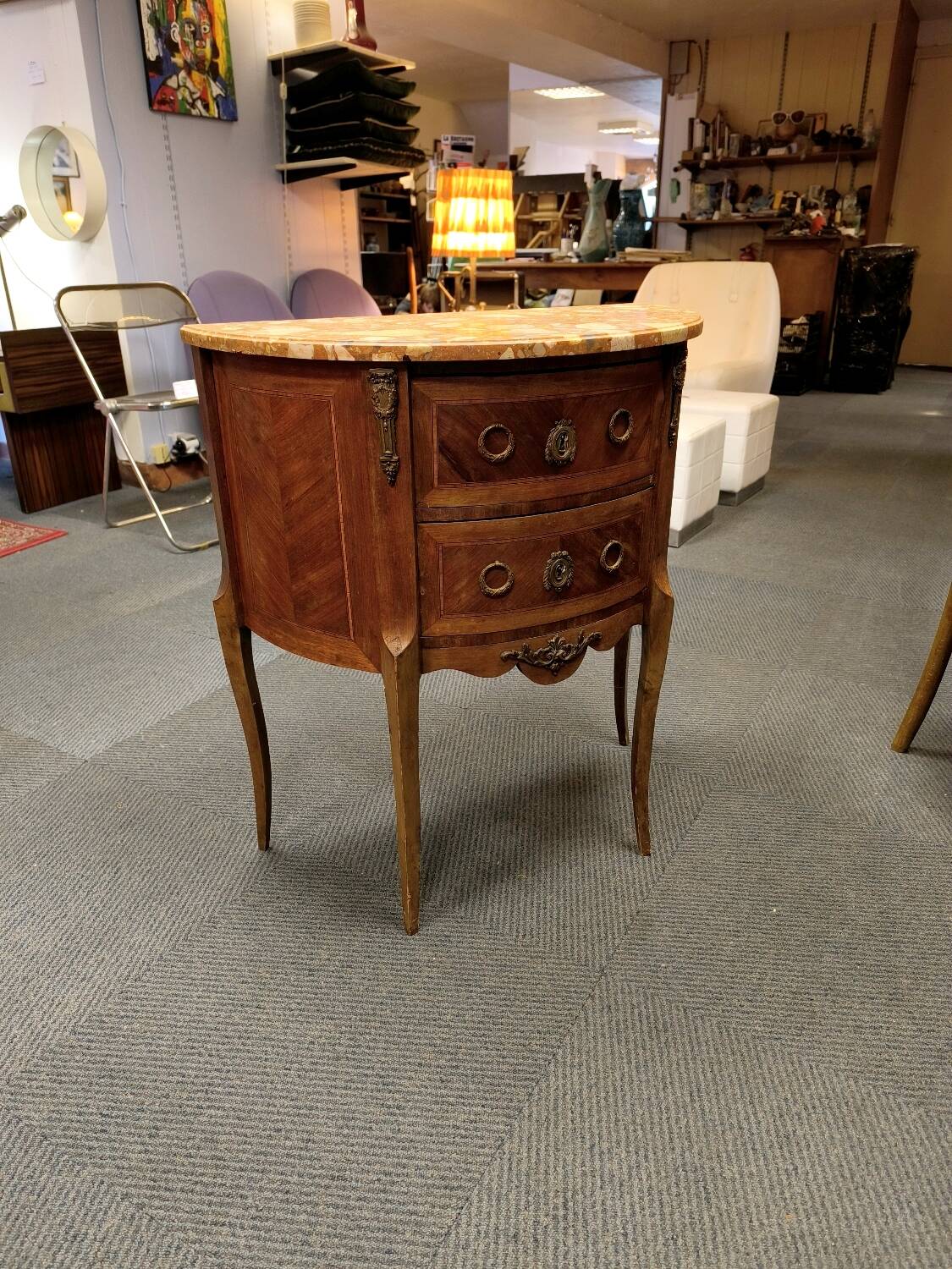 Demi-Lune commode in Louis XVI style with two drawers and veneer.