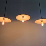 Trio of large industrial suspensions in green enamelled sheet metal.