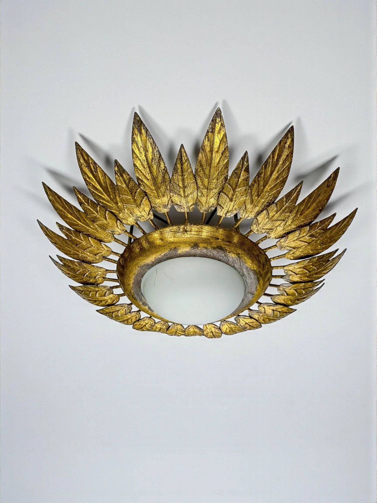 Spanish sunburst ceiling light – opaline glass & gilt iron foliage, 1960s