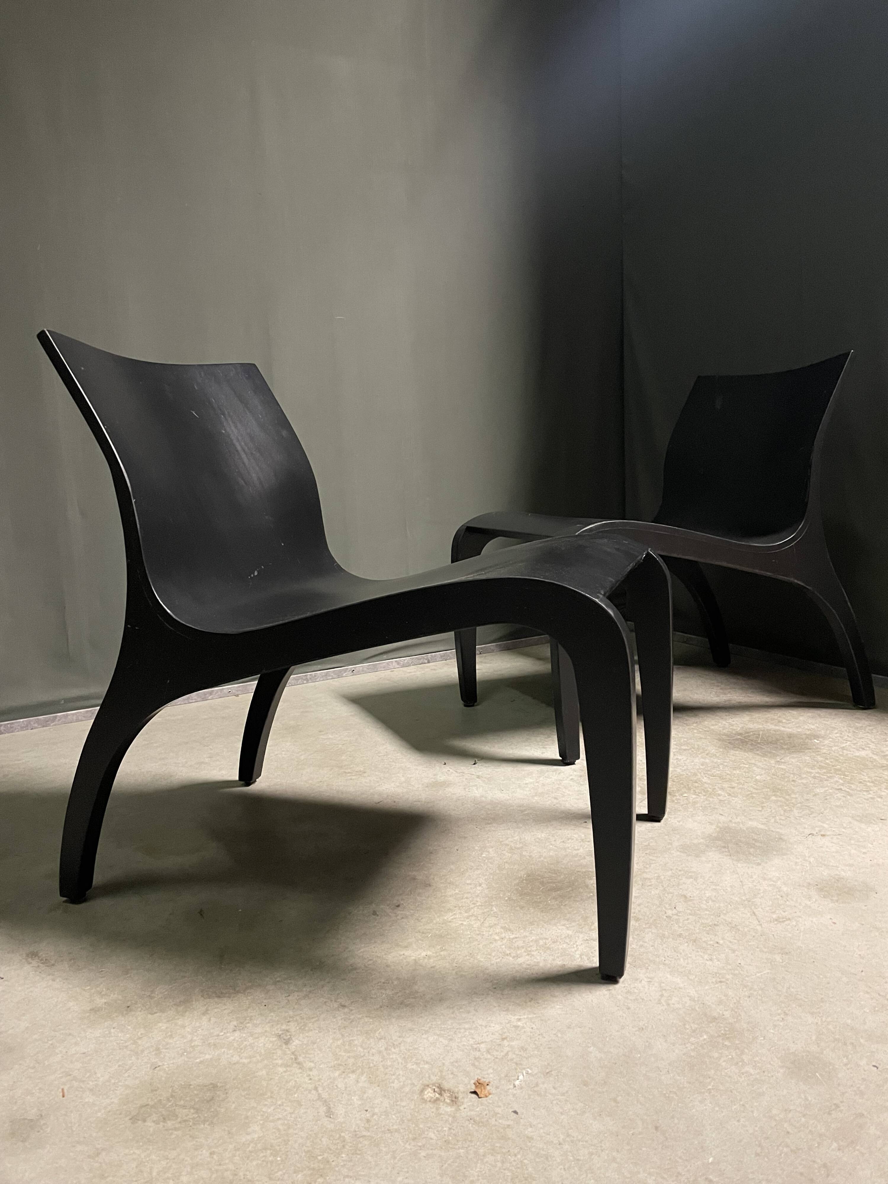 A pair Minimalist bent plywood lounge chairs